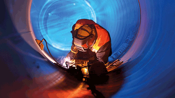 Man in Tunnel Welding